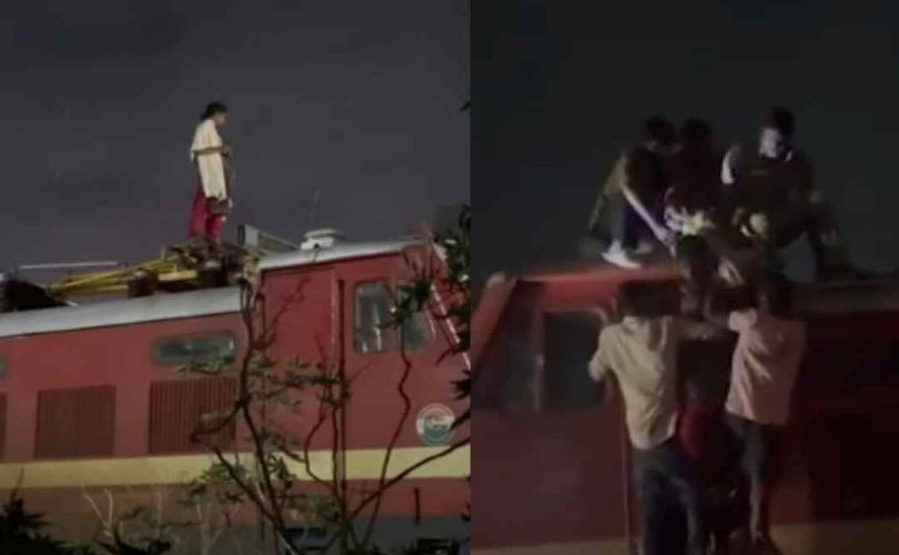 ട്രെയിനിന്റെ എൻജിന് മുകളിൽ കയറി നിന്ന യുവതിയുടെ അഭ്യാസം